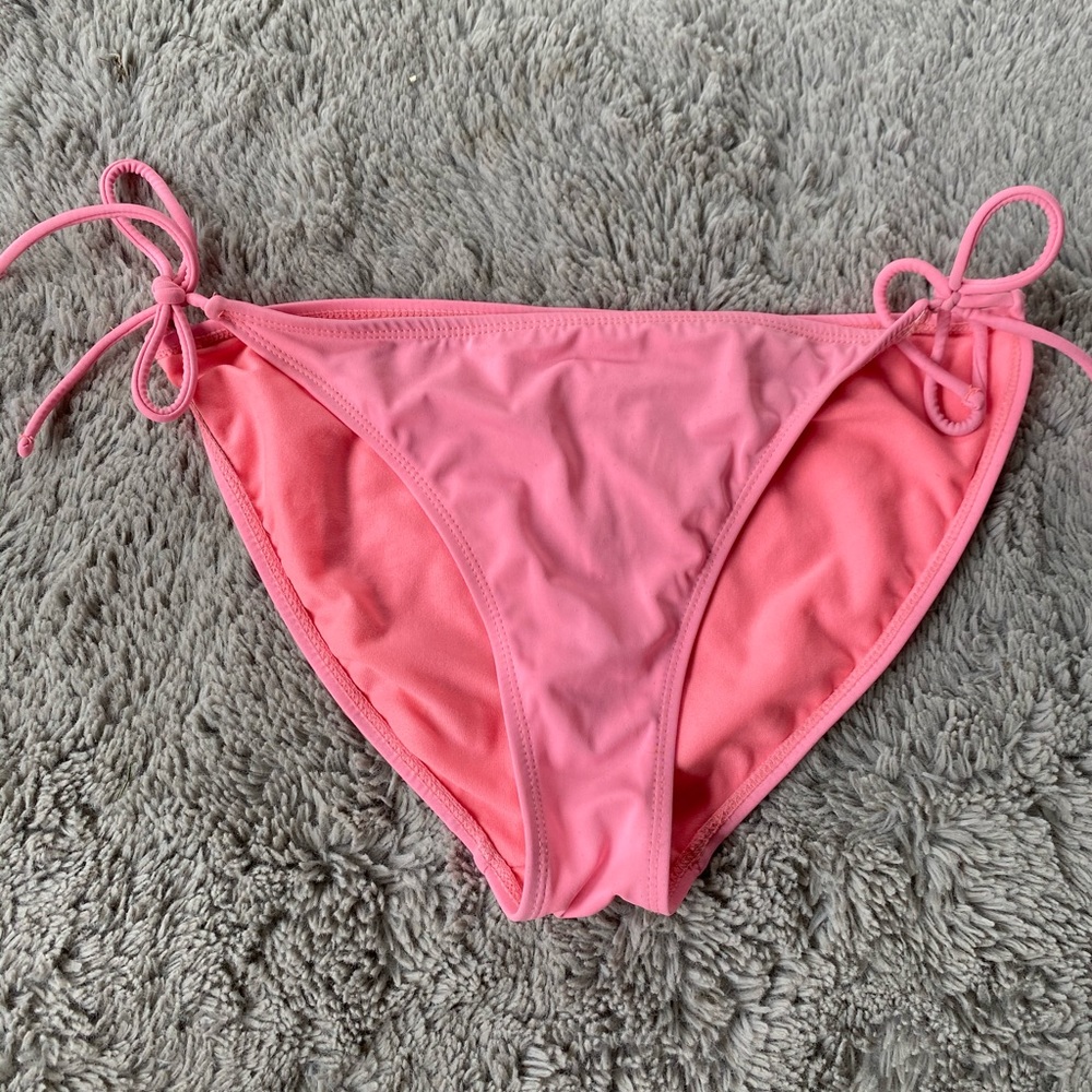 Pink/salmon bikini bottoms.